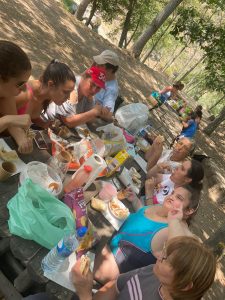 Clientes do CAARPD lancham na praia fluvial